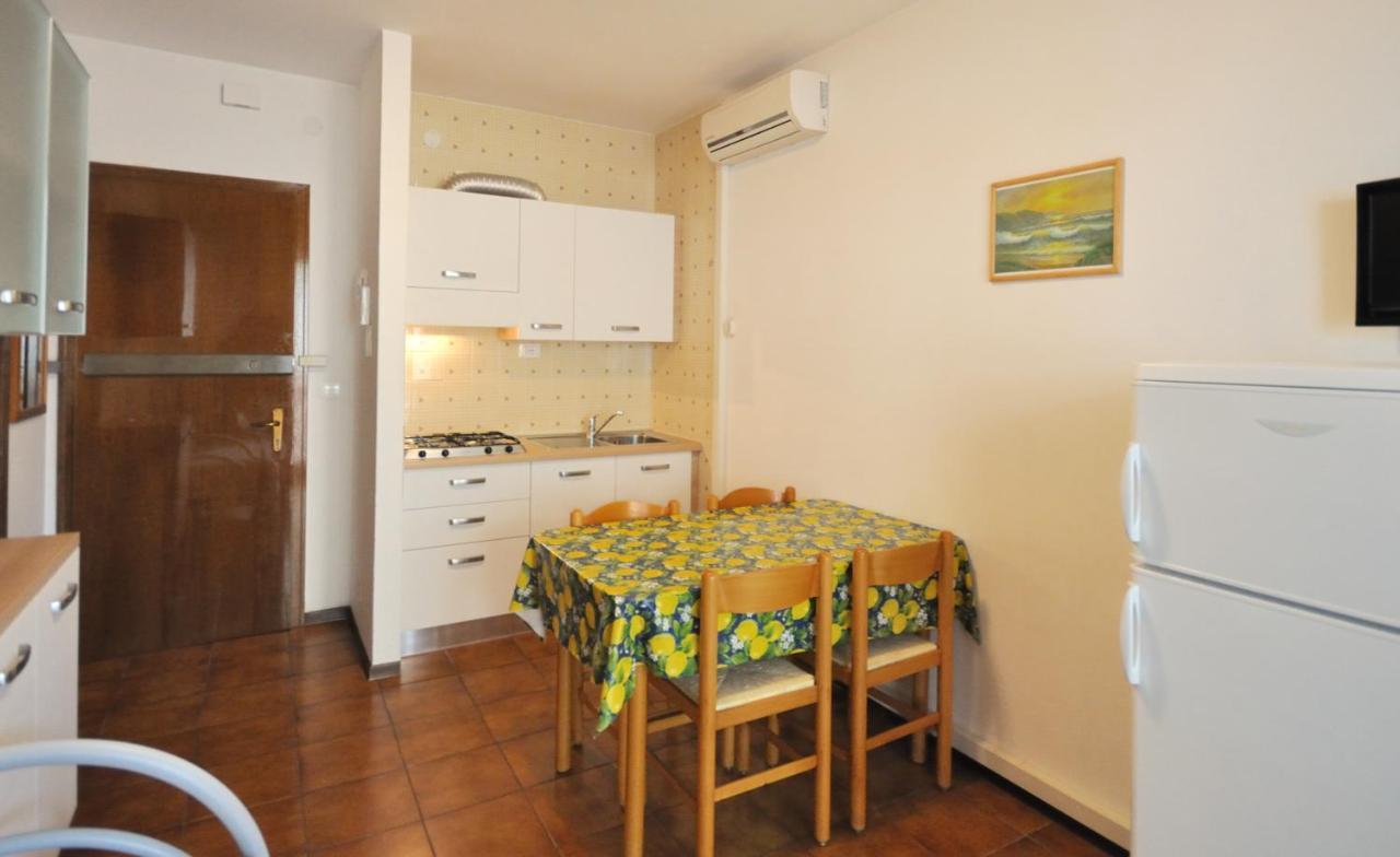 Condominio Tiziano B บิบิโอเน ภายนอก รูปภาพ